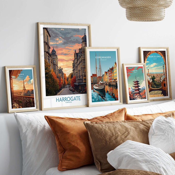 Harrogate Yorkshire Autumn Street Art Print | Sunset Avenue Poster displayed among framed travel art on a stylish sofa.