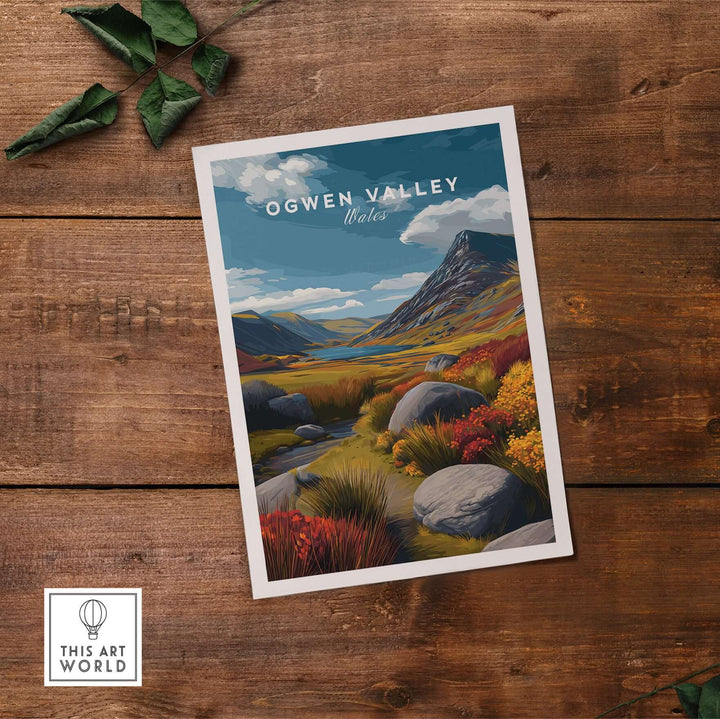 Ogwen Valley Wales print showcasing a colorful highland landscape with a stream and mountains against a blue sky.