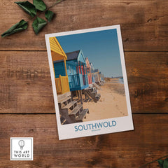 Southwold England Travel Poster featuring colorful beach huts against a coastal backdrop.