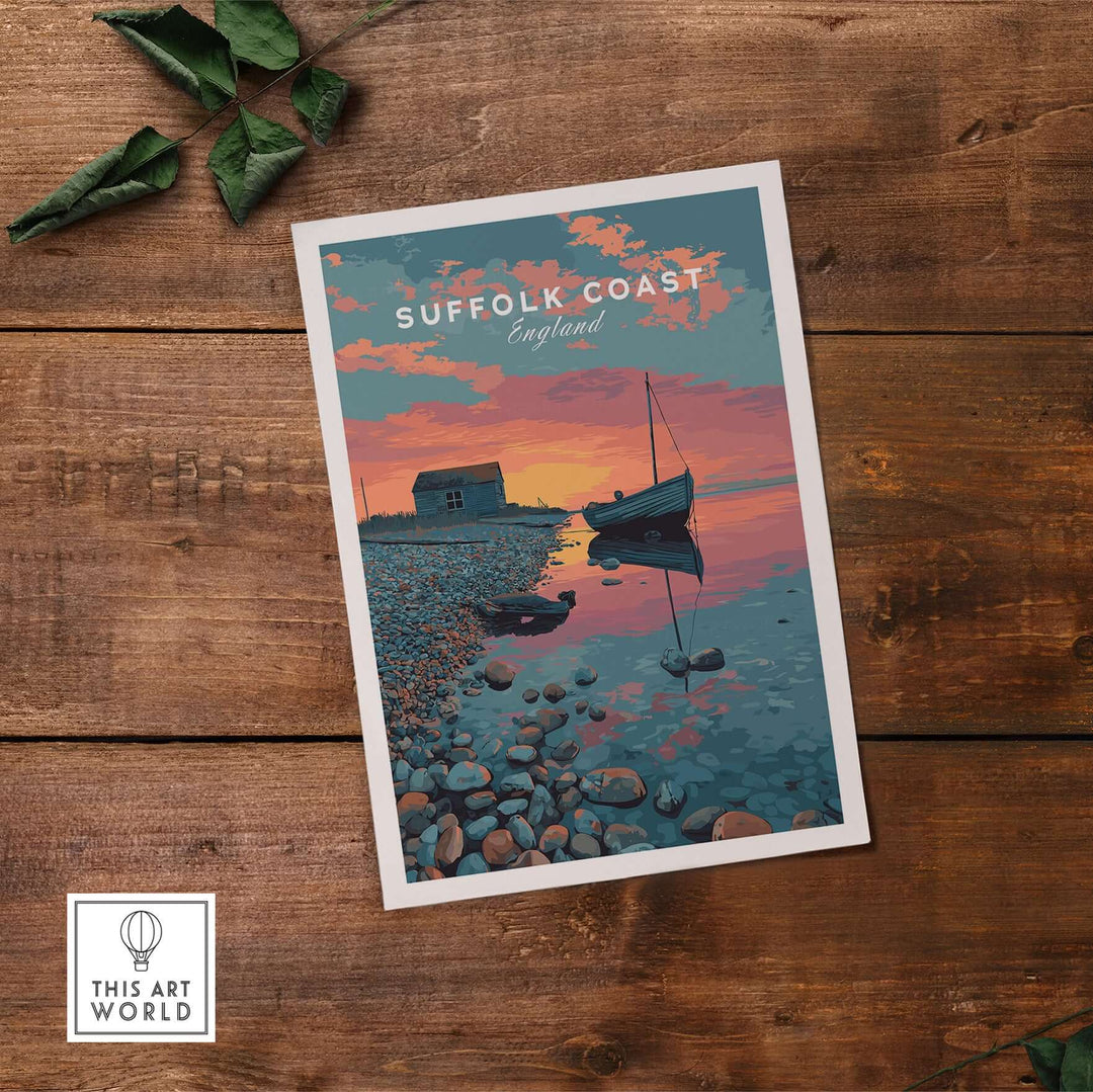 Suffolk Coast sunset print featuring a boat, coastal huts, and pebble beach on wooden background.