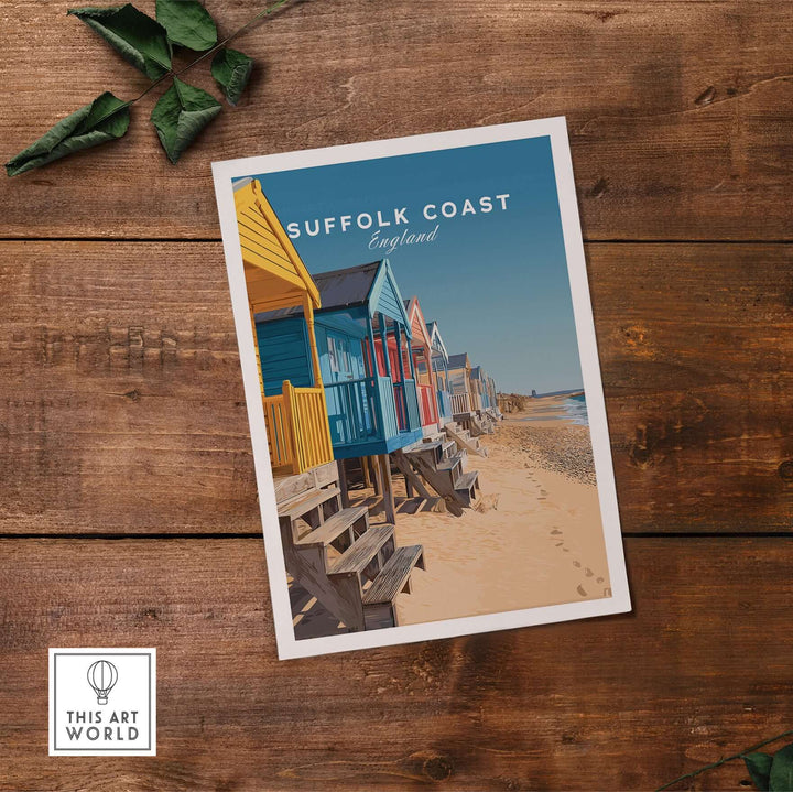 Suffolk Coast beach huts poster print featuring colorful seaside huts on sandy shoreline in England.