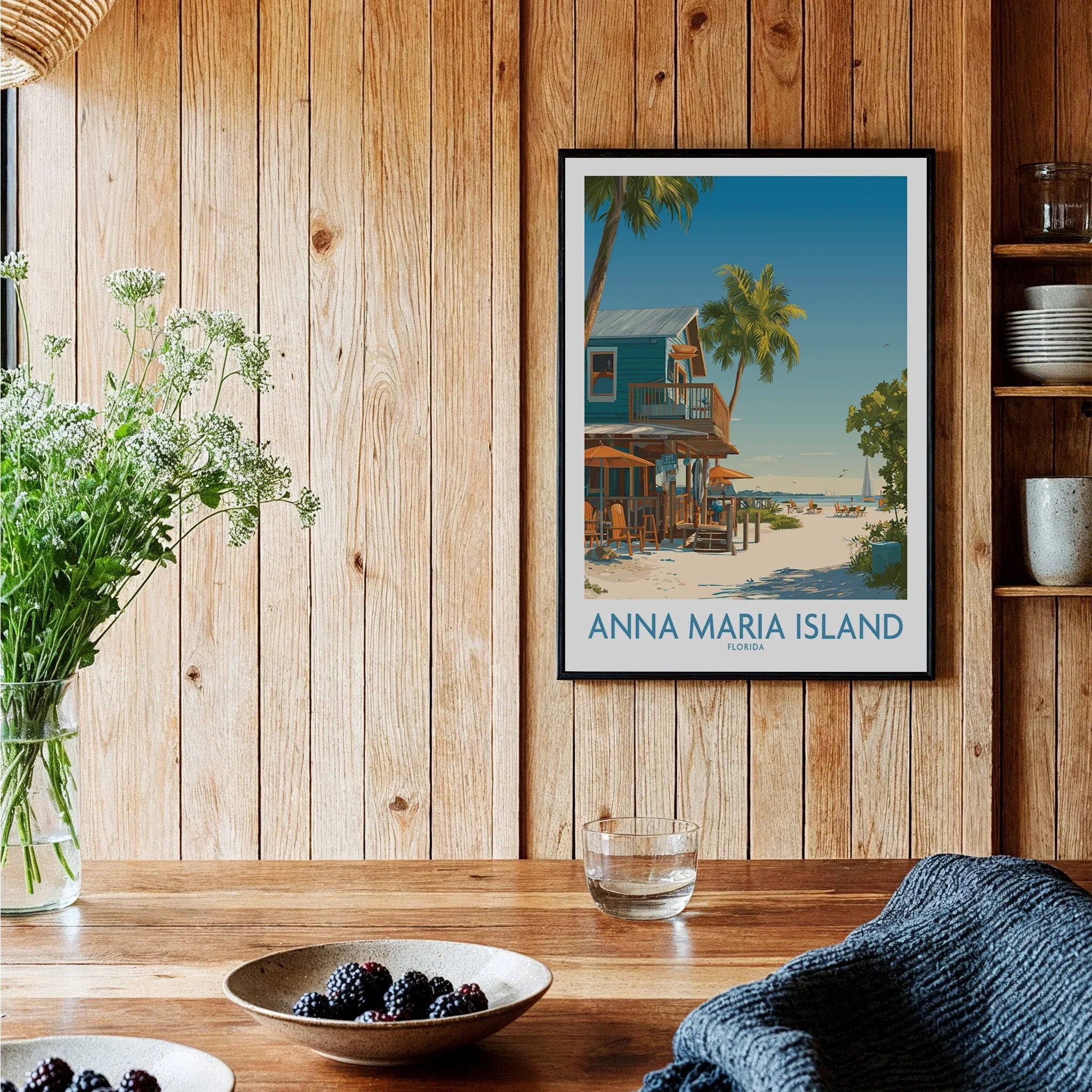 Anna Maria Island travel poster with beach house in black frame, styled in cozy kitchen decor