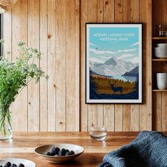 Aoraki Mount Cook National Park art print with mountain and deer in a modern wood kitchen.