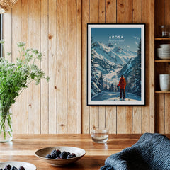 Arosa Travel Poster - Switzerland hanging in a wooden interior, showcasing snowy mountains and a skier.
