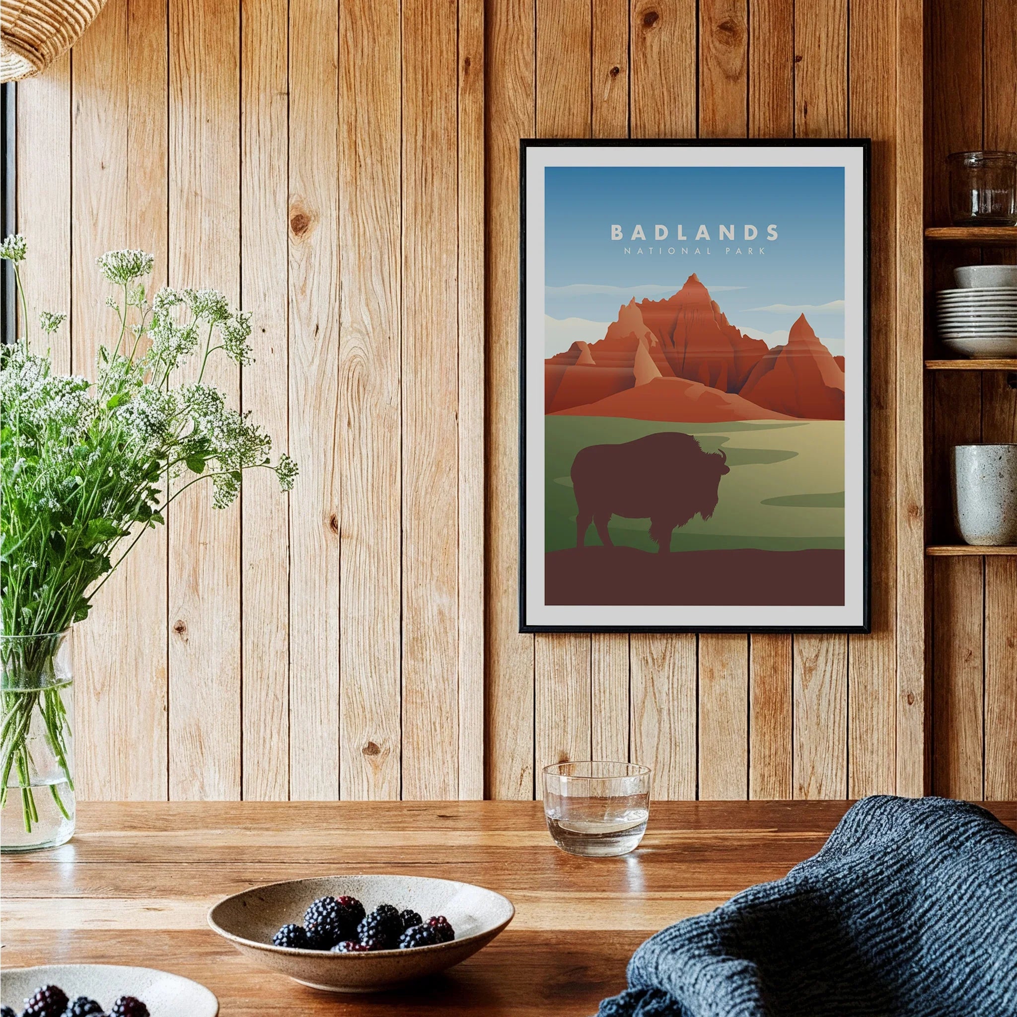 Badlands National Park art print with bison, framed on wood wall in rustic kitchen