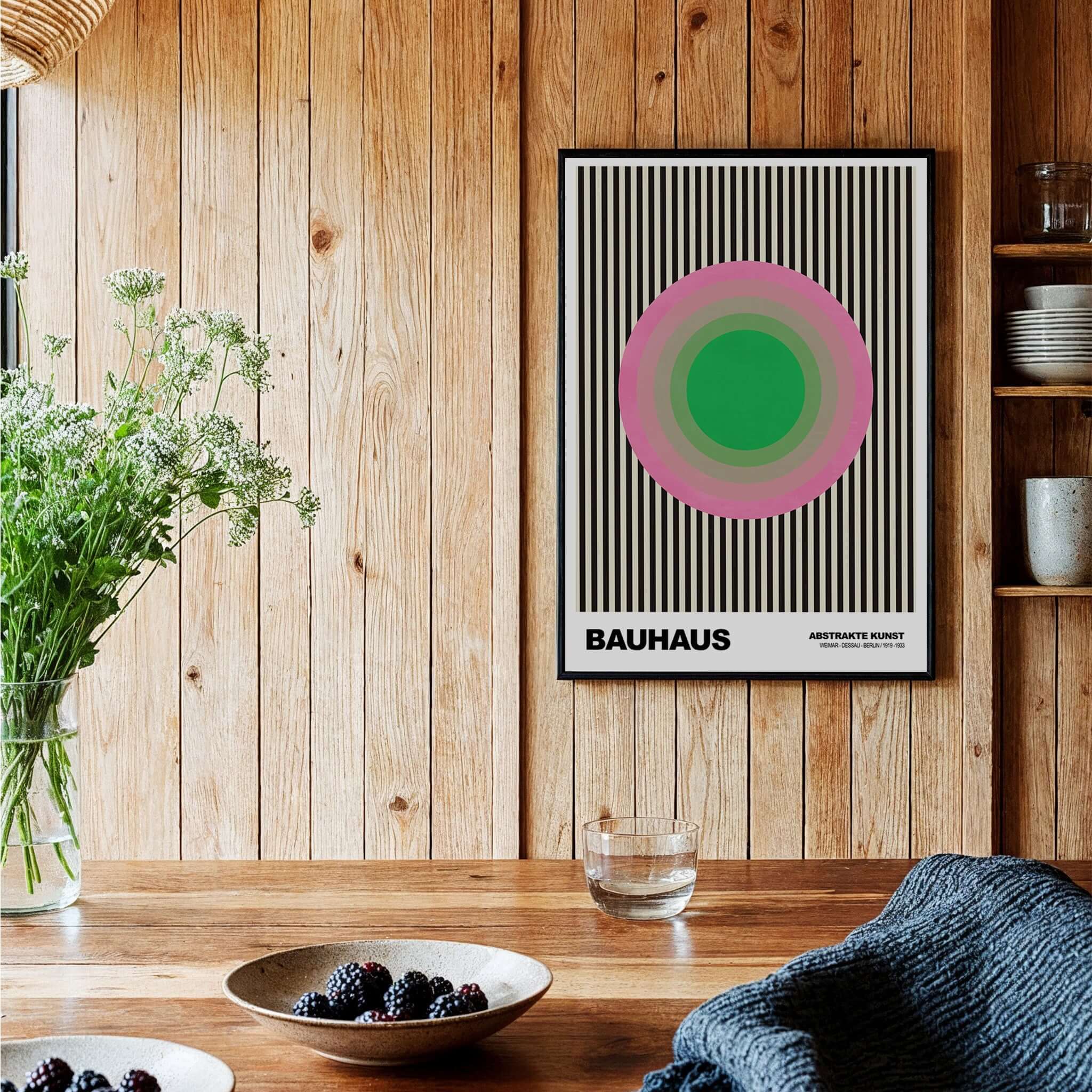 Bauhaus Exhibition Prints - Concentric Circles Poster Pink Green Striped Art displayed in a modern kitchen setting.
