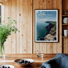 Berry Head Travel Poster – Devon Coastal Cliffs and Ocean View Print displayed in a rustic setting with wooden walls.