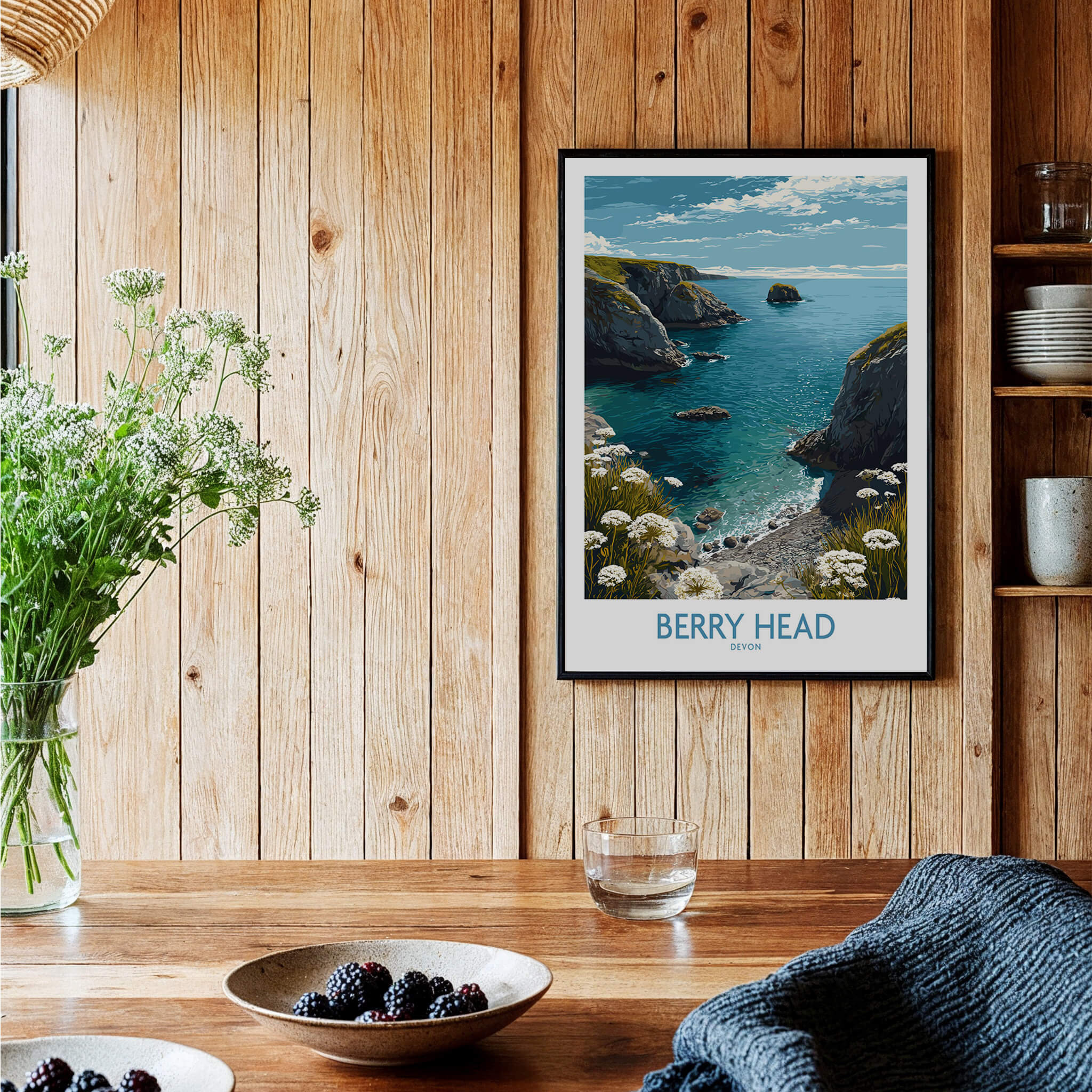 Berry Head Devon Print – Rocky Cliffs and Turquoise Sea Wall Decor displayed in a cozy interior with wooden accents.