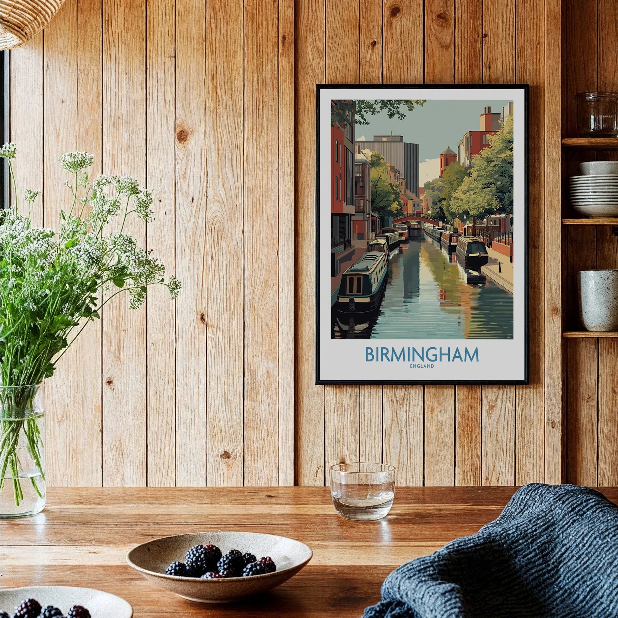Framed Birmingham city canal art print on wooden kitchen wall, rustic decor setting