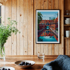Framed Birmingham city art print on wood wall in cozy kitchen decor setting