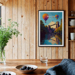 Bristol Travel Poster – Clifton Suspension Bridge and Hot Air Balloons Art displayed in a cozy wooden kitchen.