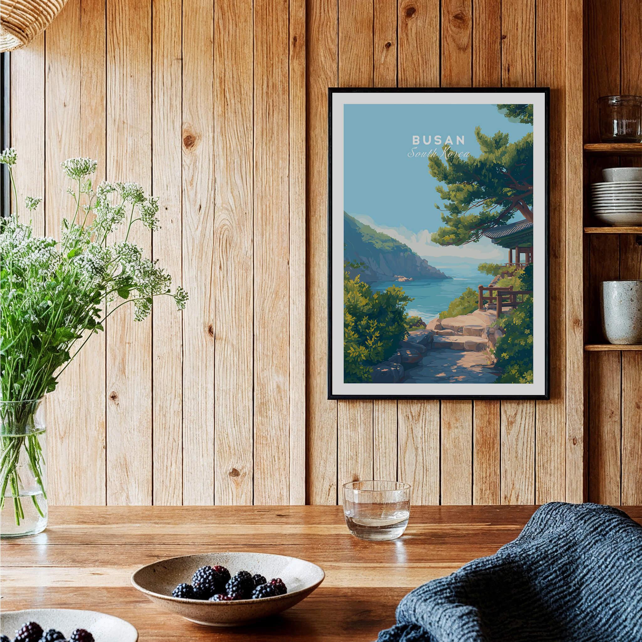 Busan travel poster wall art in black frame, styled in cozy wood kitchen decor