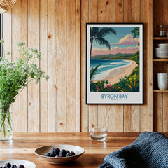 Byron Bay Poster - Australia Wall Art displayed in a cozy interior setting with wooden walls and a rustic table.