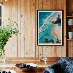 Byron Bay Art Print displayed in a cozy interior, showcasing aerial view of turquoise waters and sandy shores.