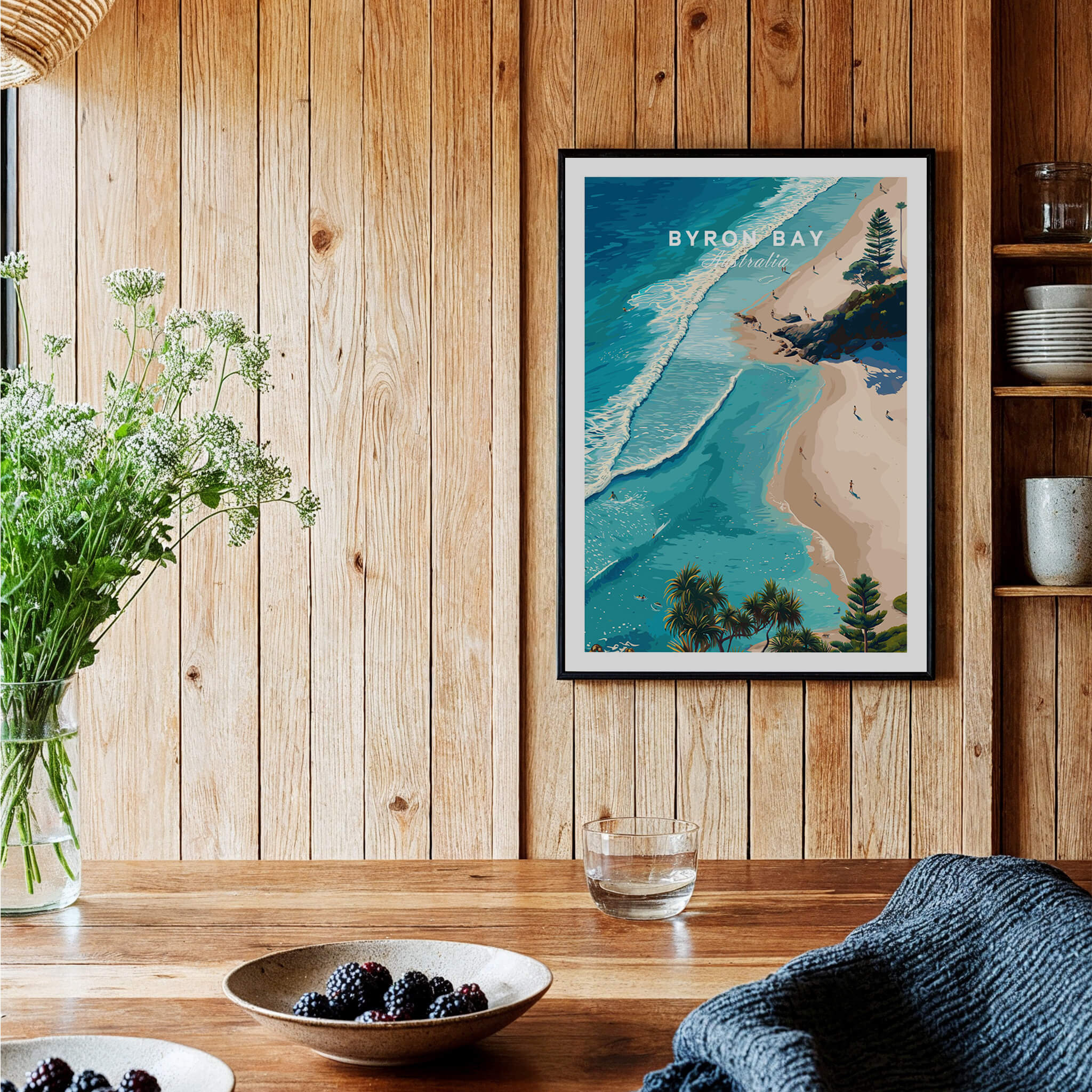 Byron Bay Art Print displayed in a cozy interior, showcasing aerial view of turquoise waters and sandy shores.