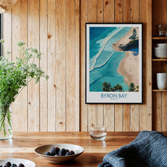 Byron Bay Beach Australia Canvas Art Print showcased in a wooden interior, featuring turquoise waves and sandy beach.