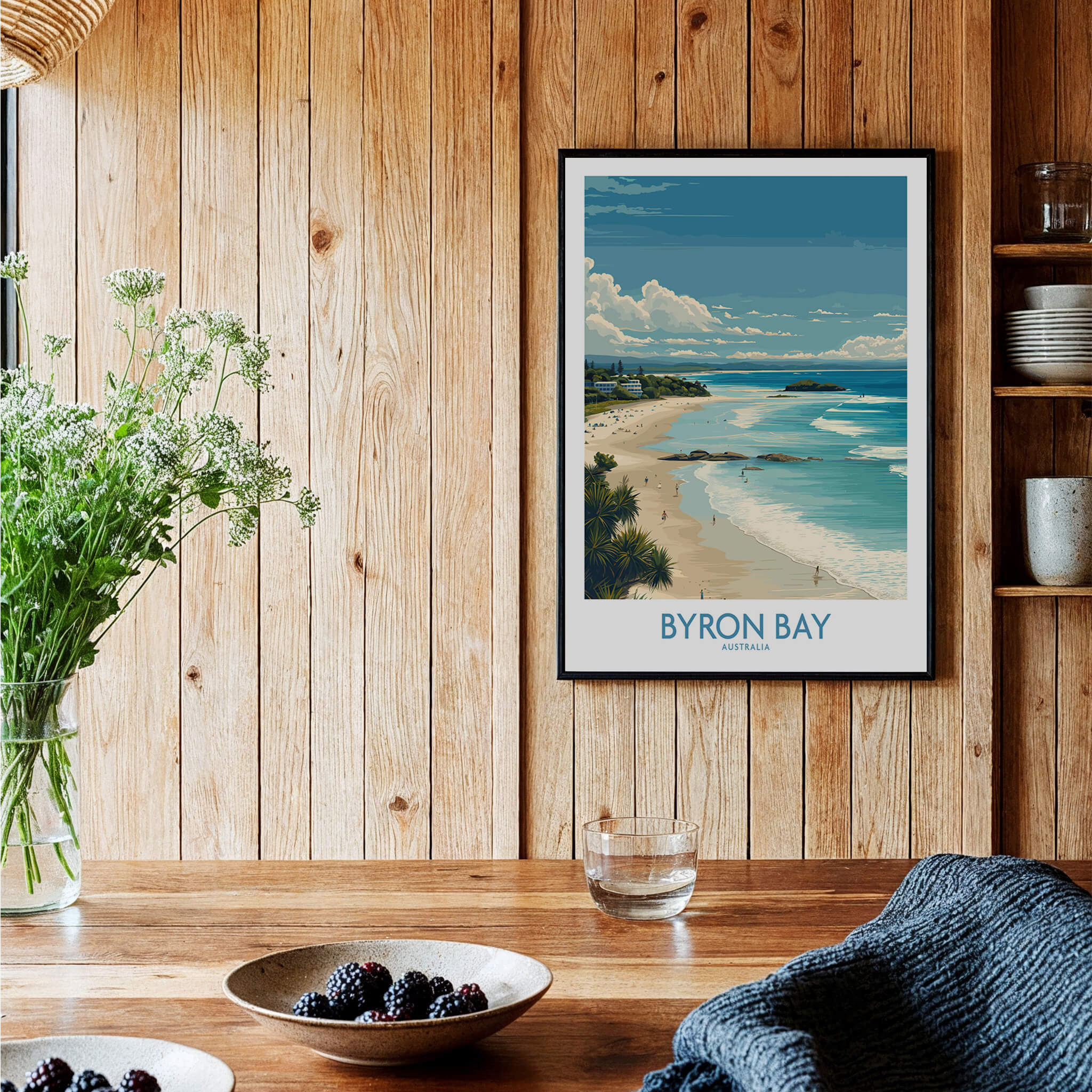Byron Bay Wall Art Australia Travel Print showcasing coastal scenery and vibrant colors in a cozy interior setting.