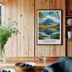 Framed Cadair Idris Wales travel poster print on wooden kitchen wall with rustic decor