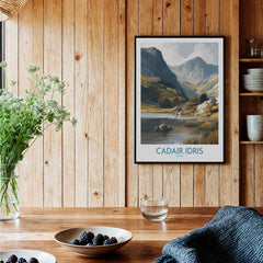 Framed Cadair Idris Wales art print in rustic kitchen with wood walls and modern decor.