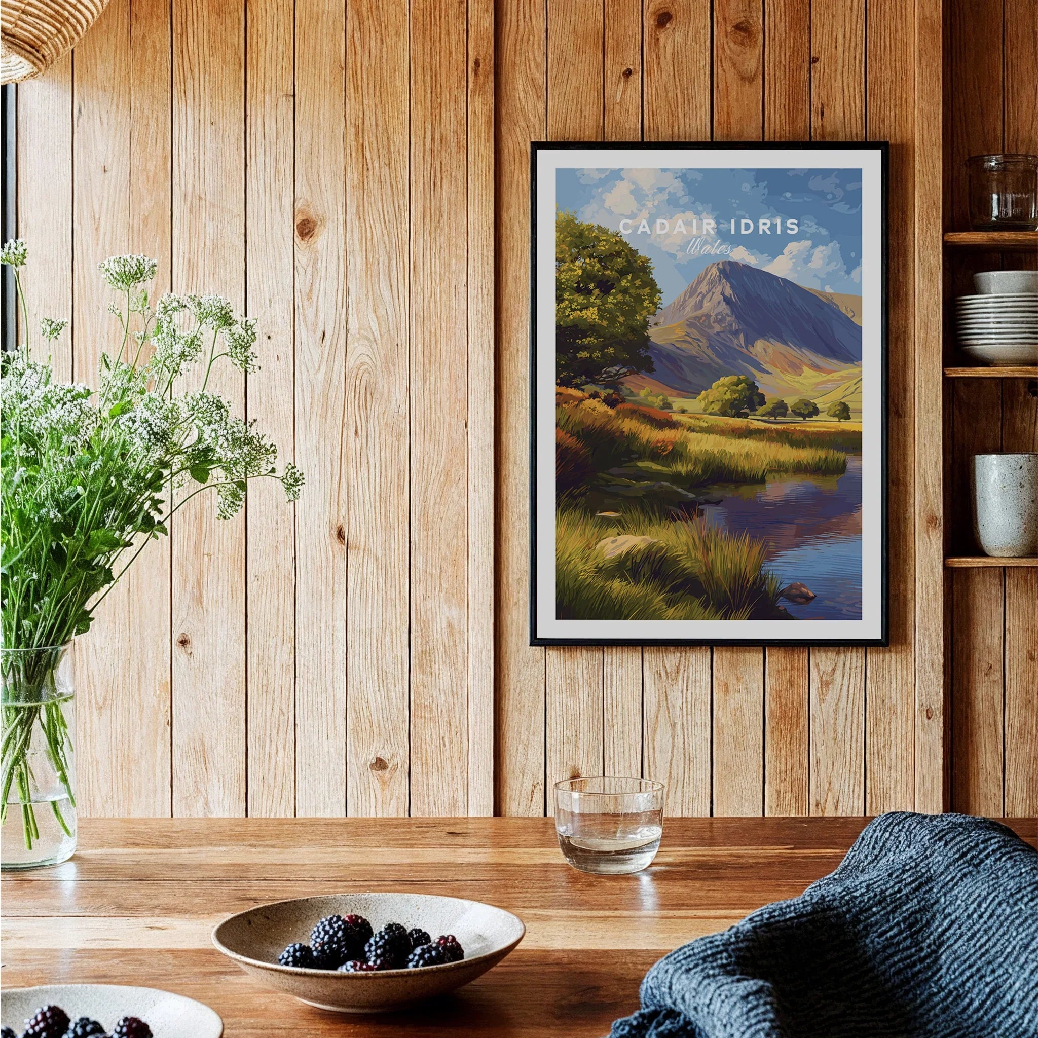 Framed Cadair Idris Wales travel poster art print on wooden kitchen wall with rustic decor