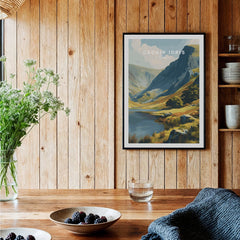 Framed Cadair Idris travel poster print in wooden kitchen with rustic decor and wildflowers