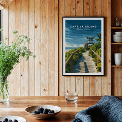 Captiva Island Poster – Florida Beach Print framed in a rustic wooden setting with plants and bowls.