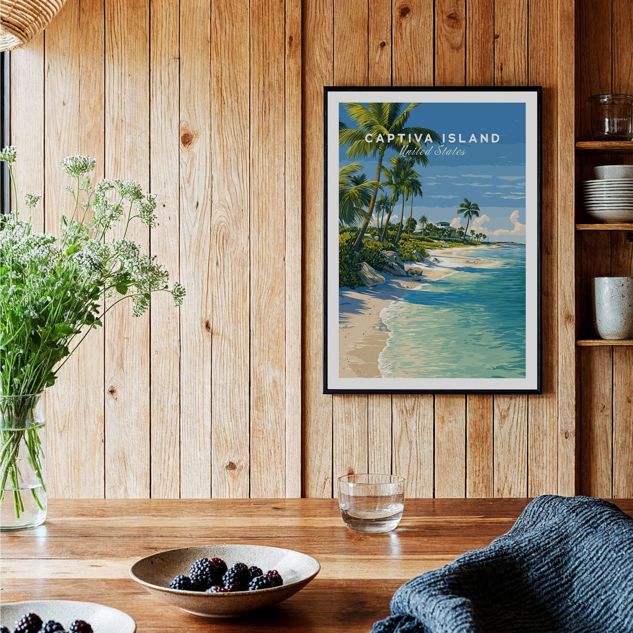 Captiva Island Travel Poster – White Sand Beach and Turquoise Water Art displayed on a wooden wall with plants and decor.