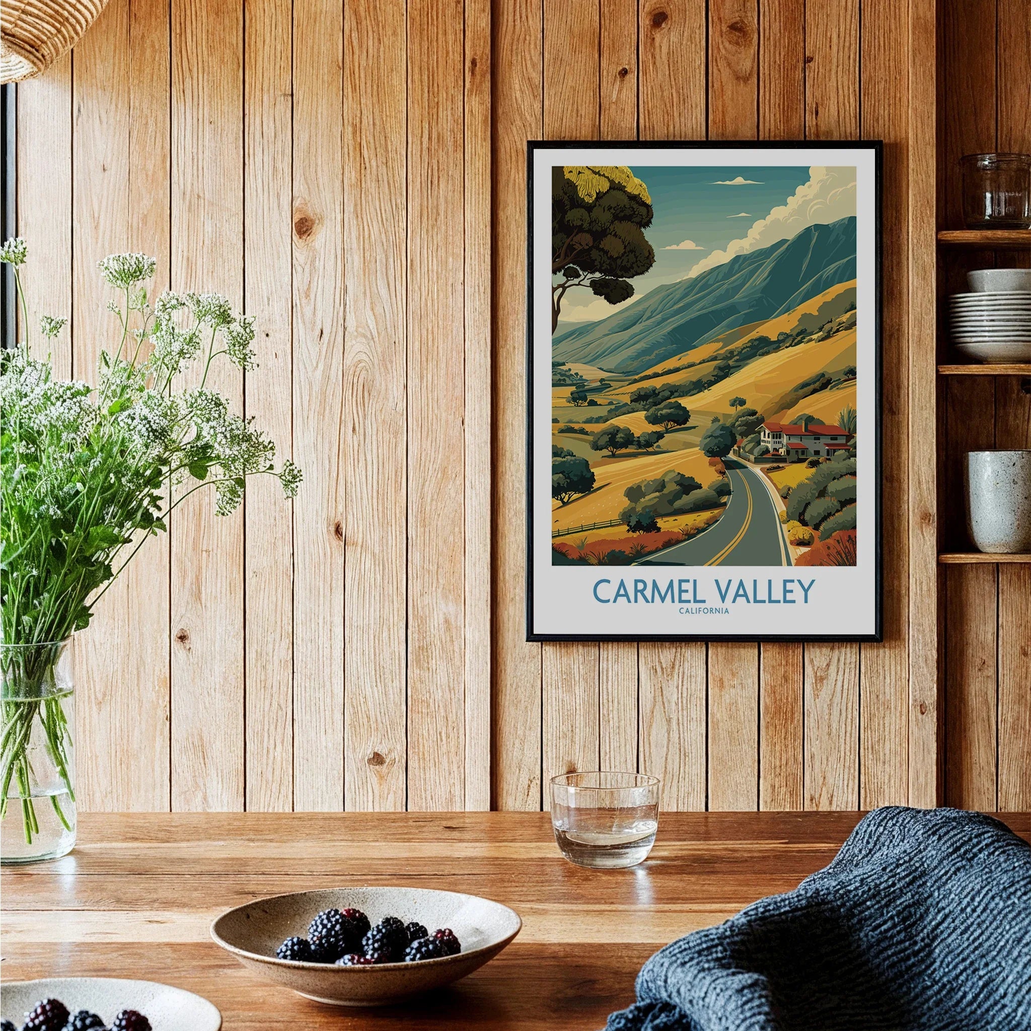 Carmel Valley California travel poster art print framed on a wooden kitchen wall