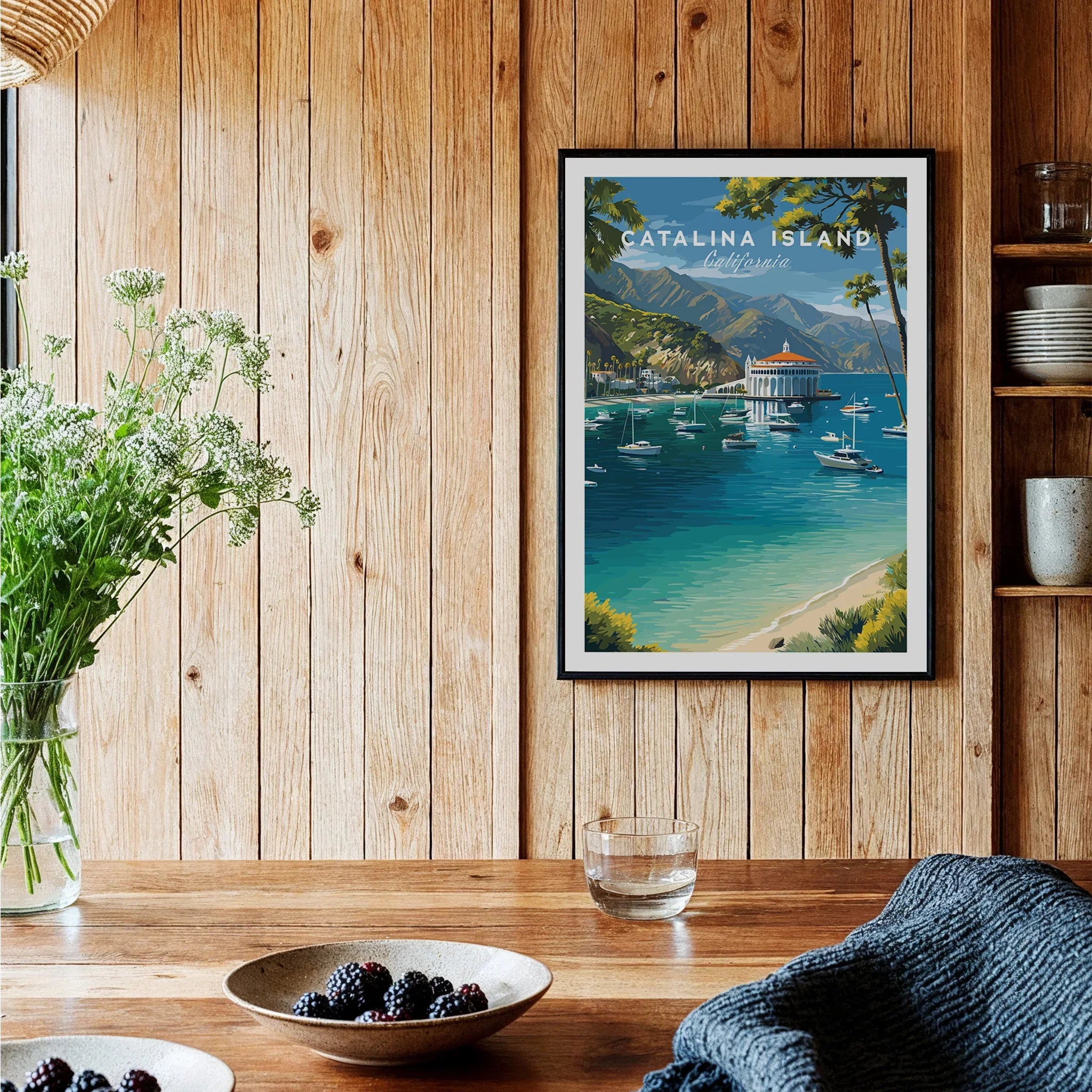 Catalina Island travel poster art print in black frame hanging on wooden kitchen wall