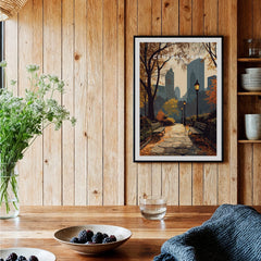 Framed Central Park art print with city skyline on wooden kitchen wall, cozy decor
