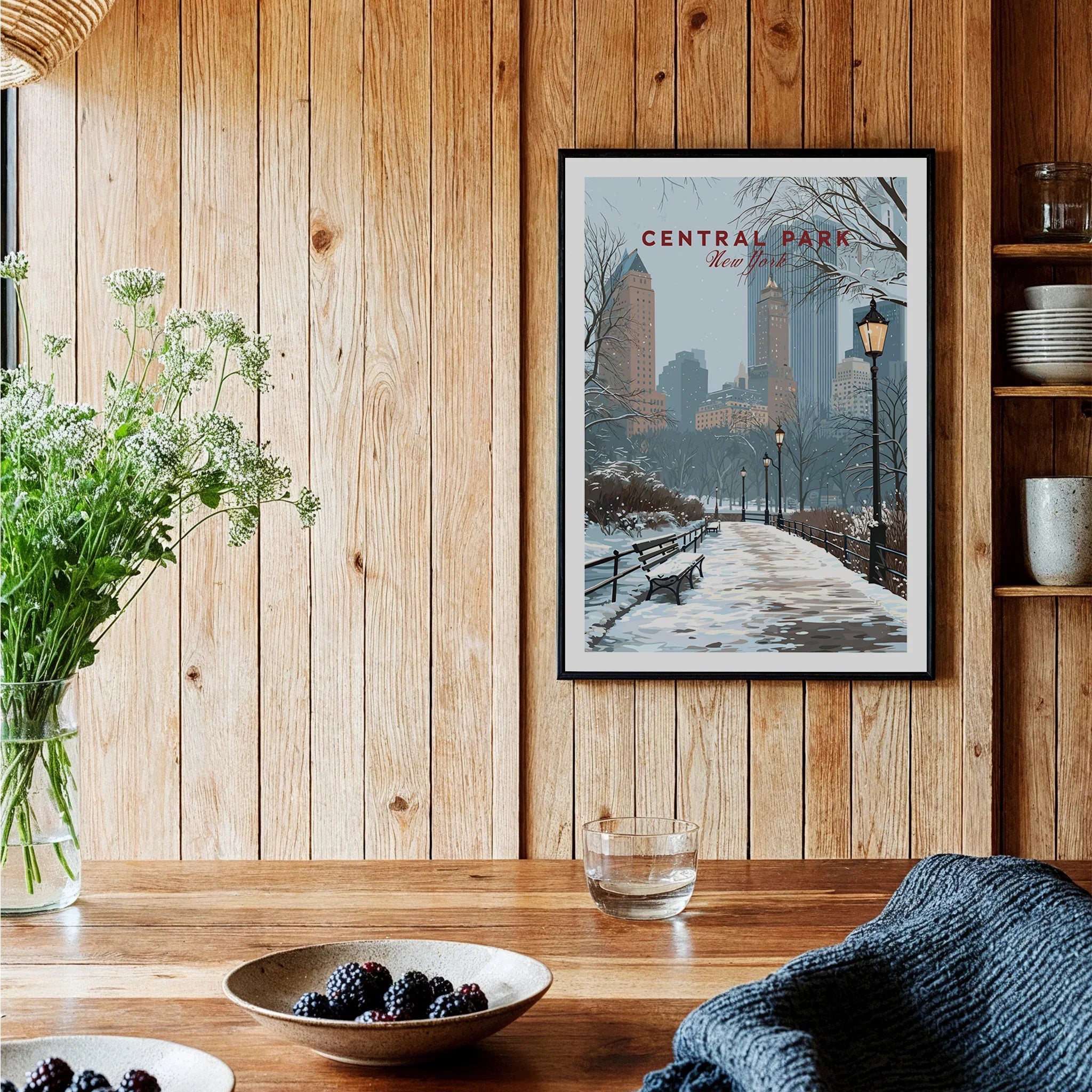 Central Park New York art print with snowy path and city skyline in rustic kitchen setting