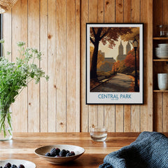 Central Park art print in black frame on wooden wall in cozy kitchen setting