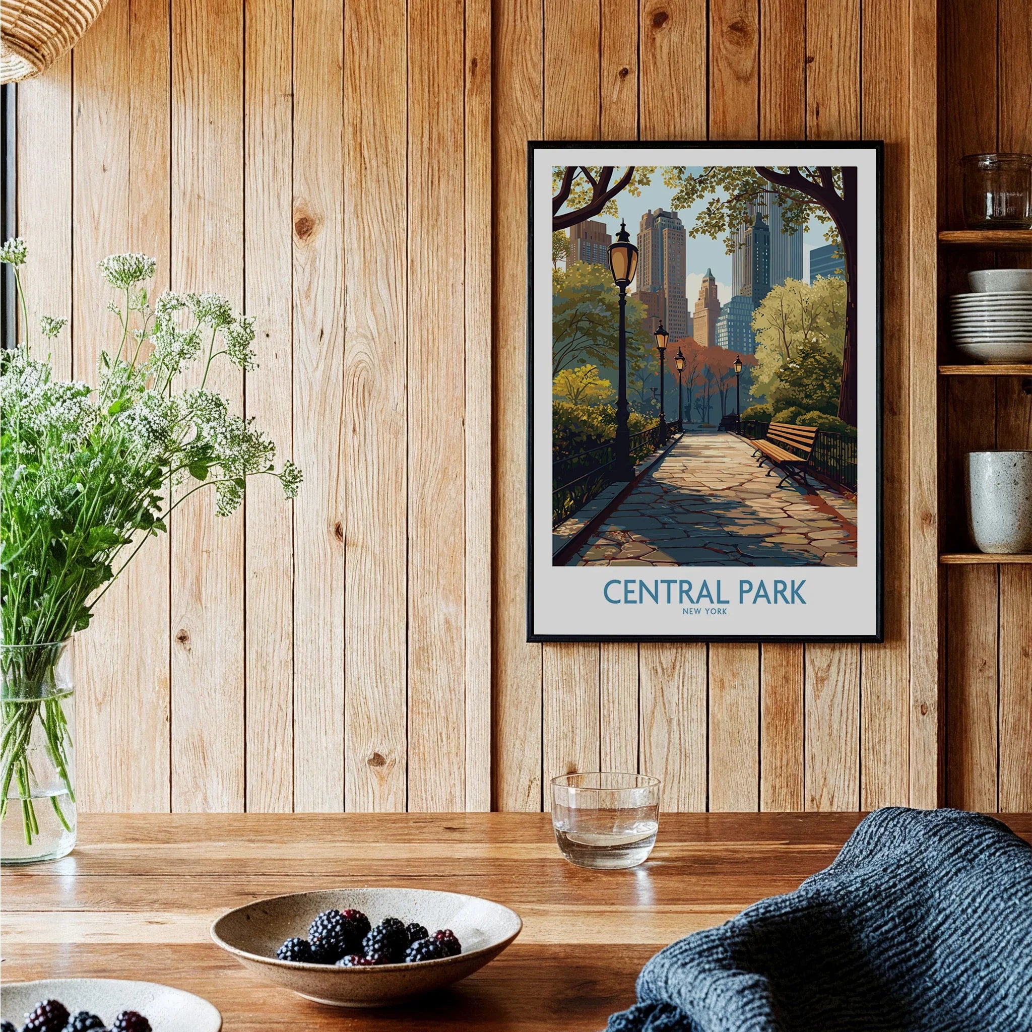 Central Park framed art print with city skyline hangs in modern wooden kitchen decor