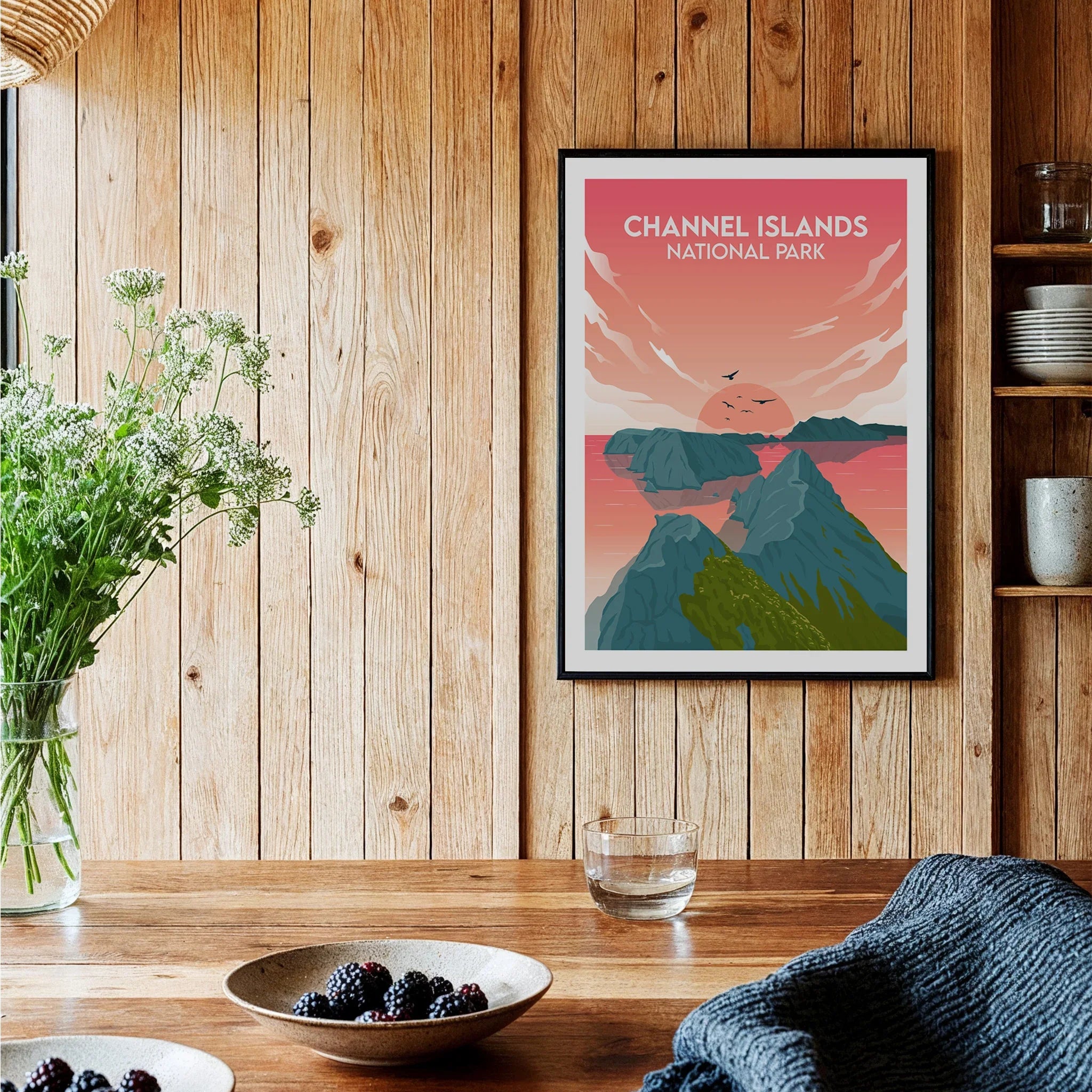 Channel Islands National Park art print in black frame on wood wall in cozy kitchen setting