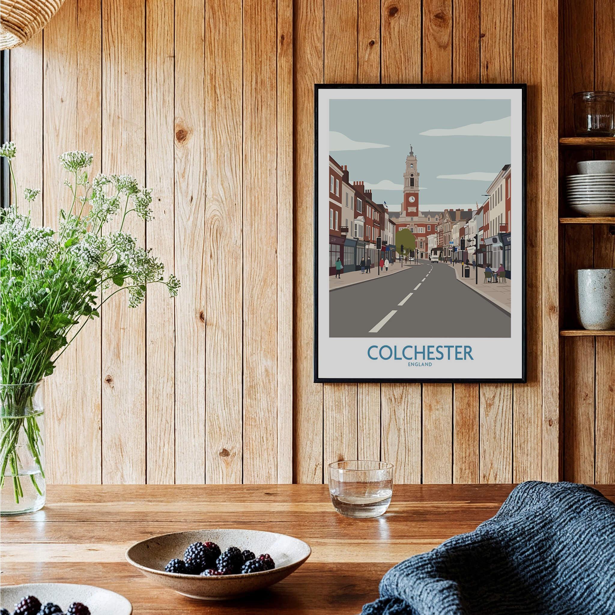 Colchester city skyline art print in black frame, displayed in a rustic kitchen setting