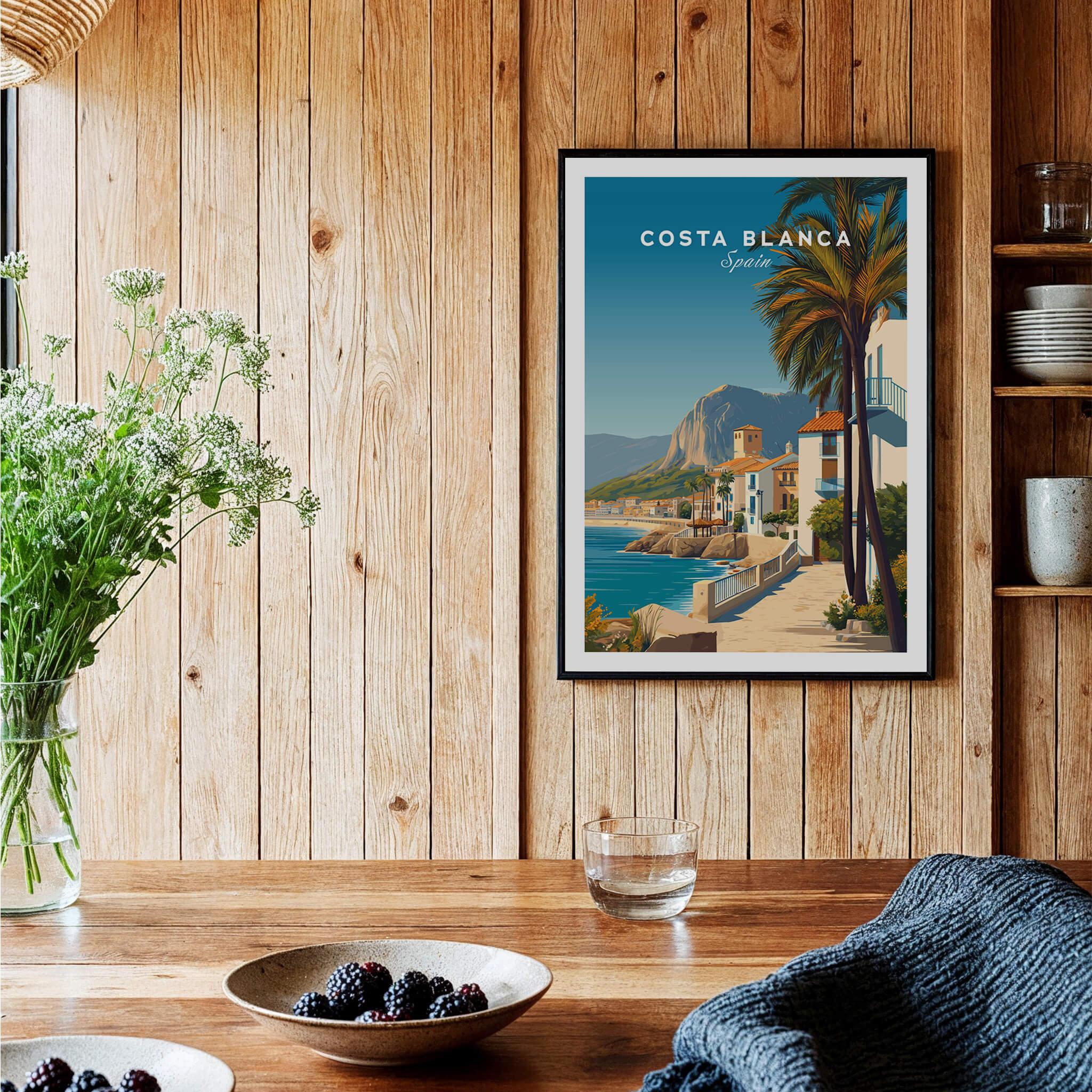 Costa Blanca Travel Poster - Spain Canvas Print displayed in a cozy wooden interior with rustic decor.