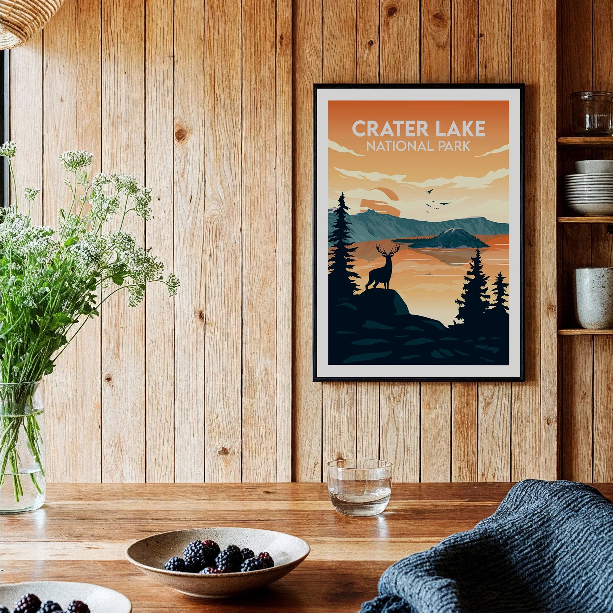 Crater Lake National Park travel poster art print in black frame on wooden kitchen wall