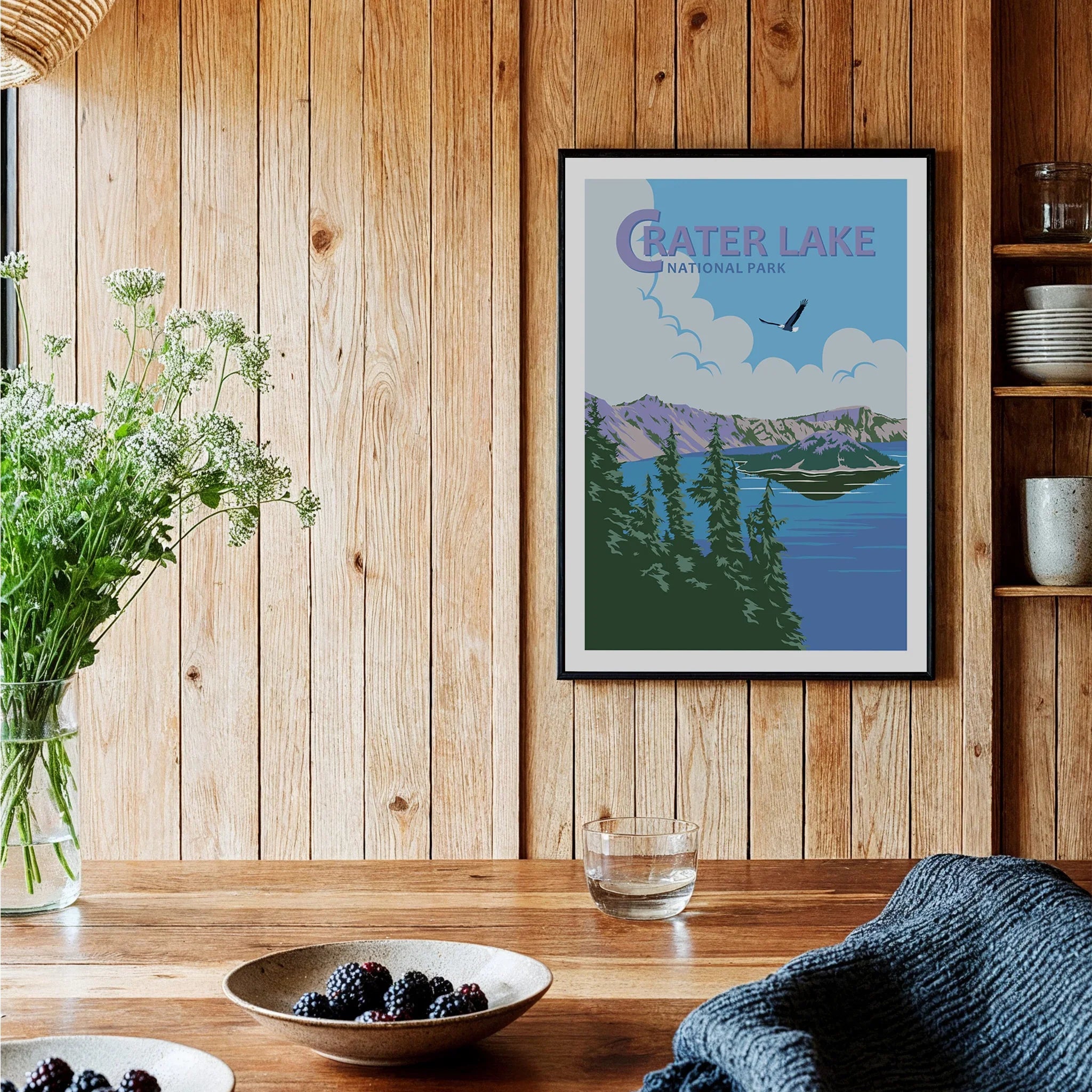 Crater Lake National Park art print in black frame hanging in rustic kitchen decor setting