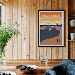 Death Valley National Park art print with desert landscape in black frame, styled in rustic kitchen