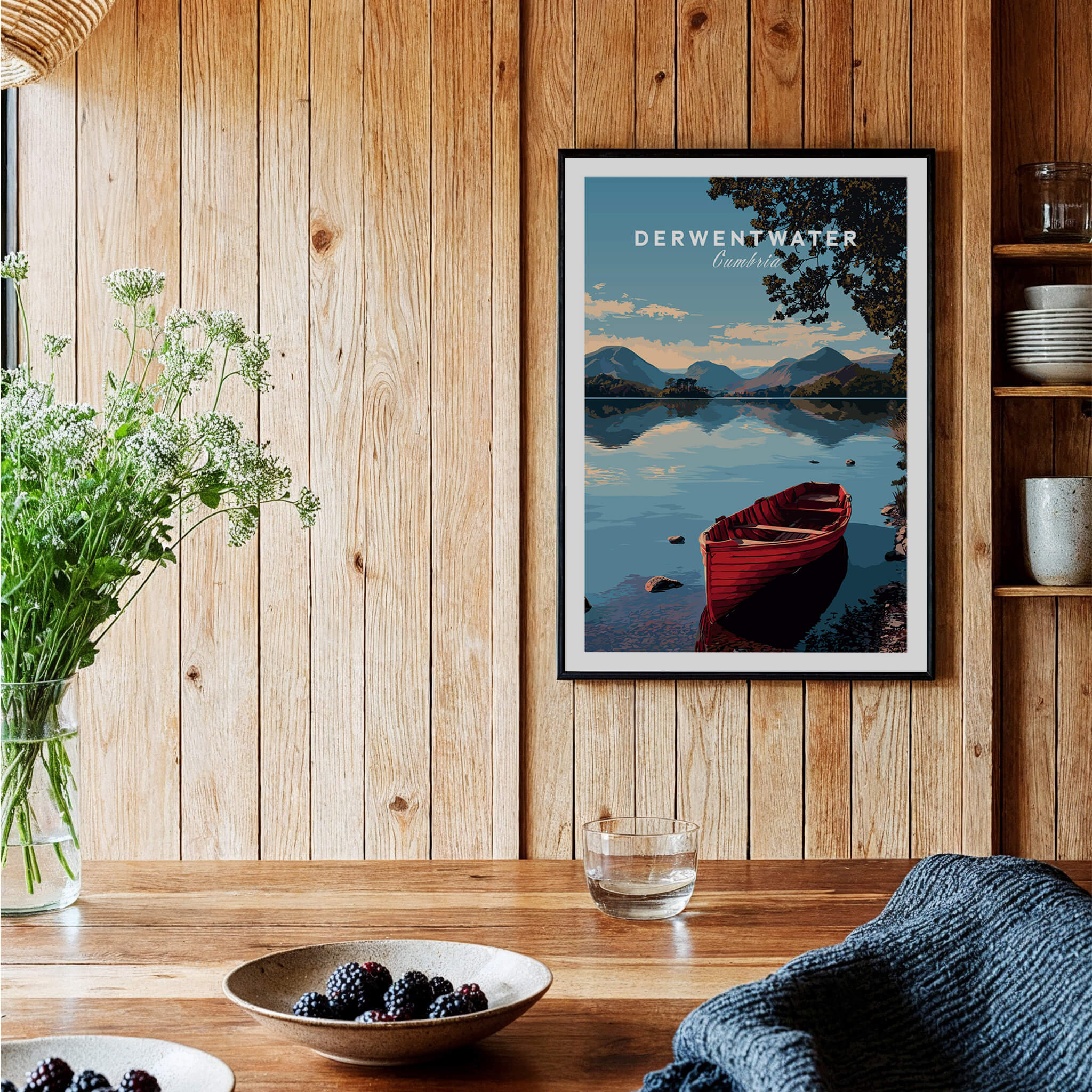 Derwentwater Travel Poster – Lake District Art Print displayed in a rustic kitchen setting with wooden decor.