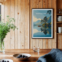 Derwentwater Print – Lake District Sunset Poster displayed in a rustic wooden setting with flowers and tableware.
