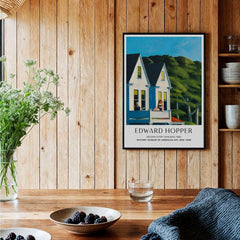 Edward Hopper Second Story Sunlight 1960 Art Print - Whitney Museum displayed on wooden wall with plants.