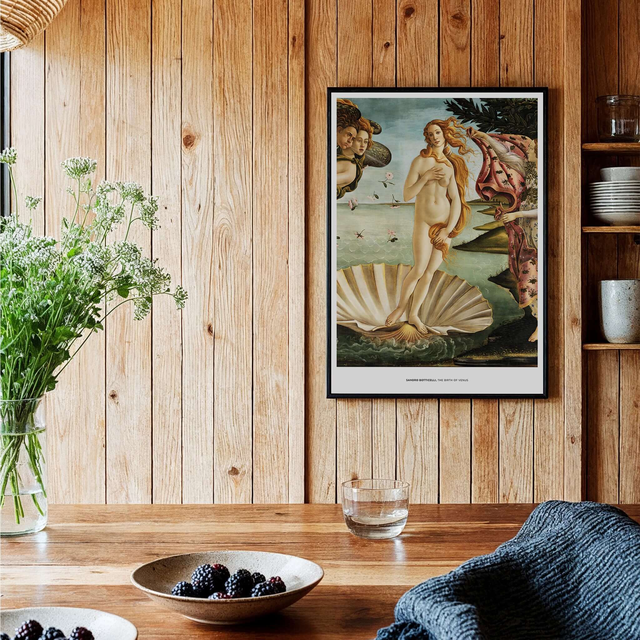 The Birth of Venus Art Print Sandro Botticelli Mythology Poster framed on wooden wall in a stylish home interior.