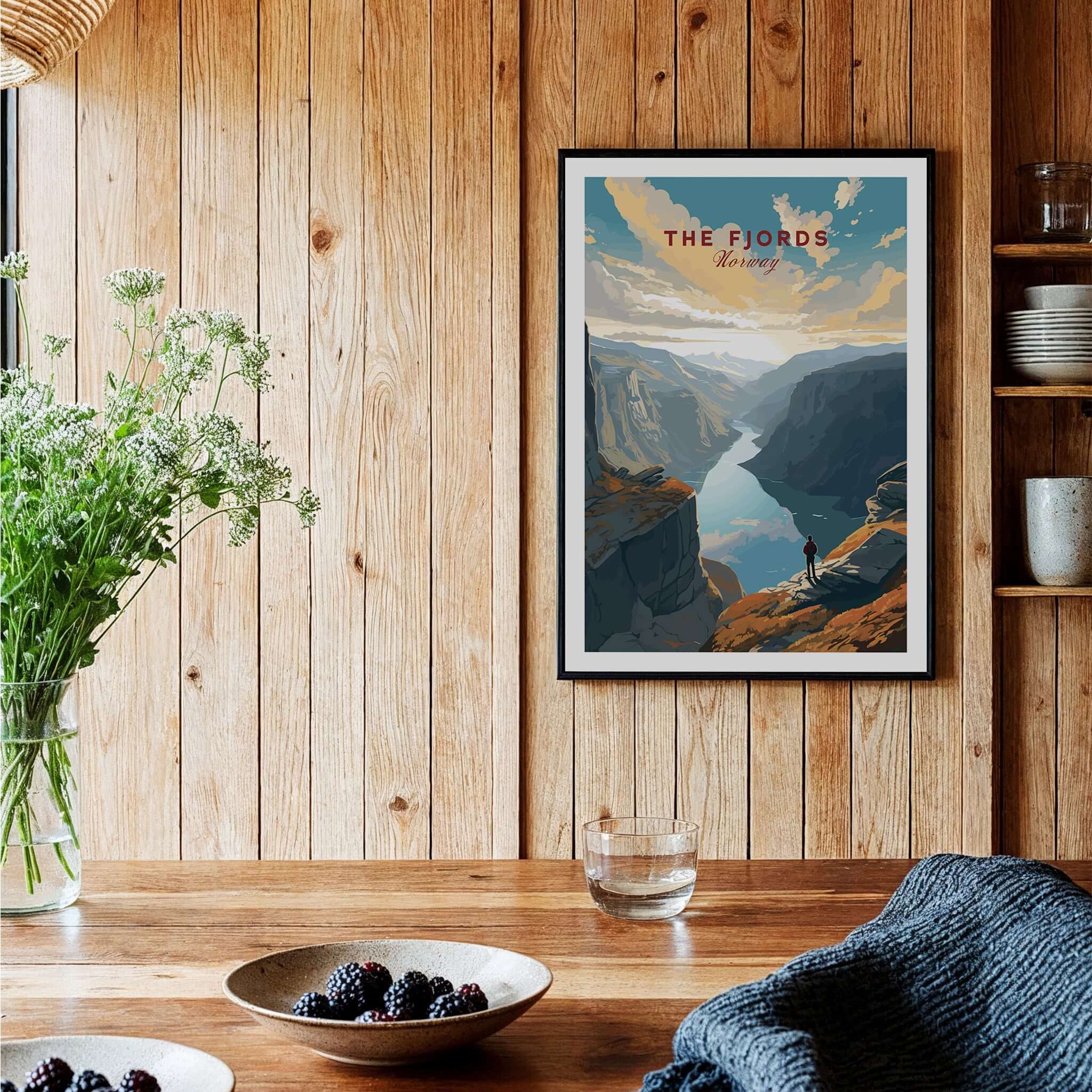 Fjord Wall Art Print - Norway displayed in a cozy room with wooden walls and natural decor.