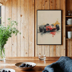 Framed art print of a vintage red race car hung in a rustic kitchen setting with wood walls.