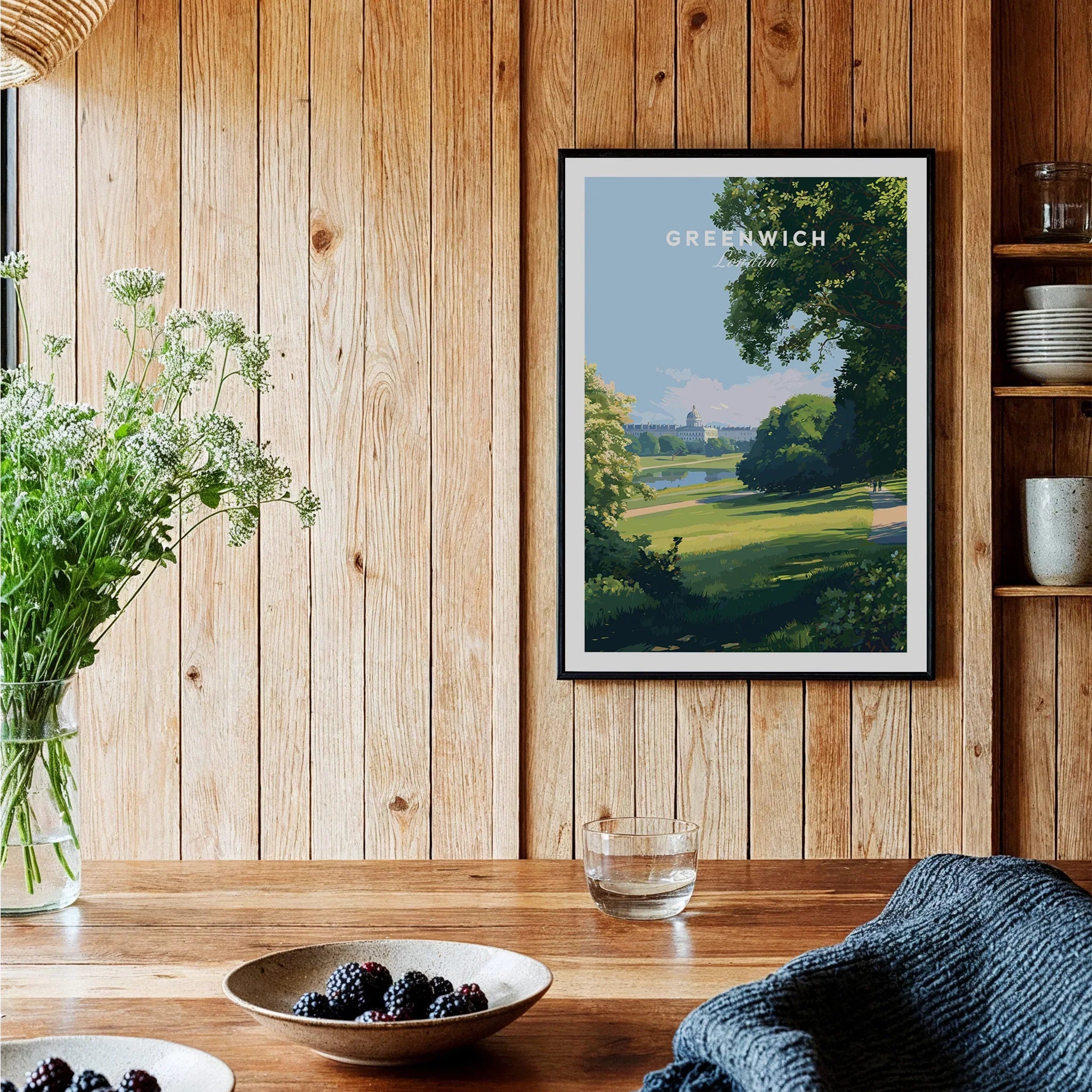 Framed Greenwich art print on wooden kitchen wall with rustic decor and fresh berries