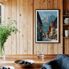 Gruyères Switzerland Wall Art Print | Medieval Village Street Travel Poster hanging in a cozy interior with wooden decor.
