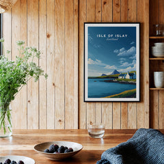 Isle of Islay Scotland Travel Posters | Sunny Coastal Wall Art Print featuring coastal scene with house and mountains.