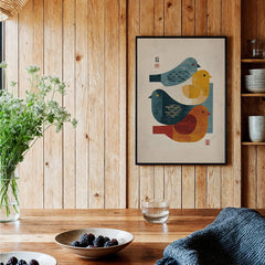 Japanese-inspired framed art print with stylized birds in a cozy wood kitchen setting