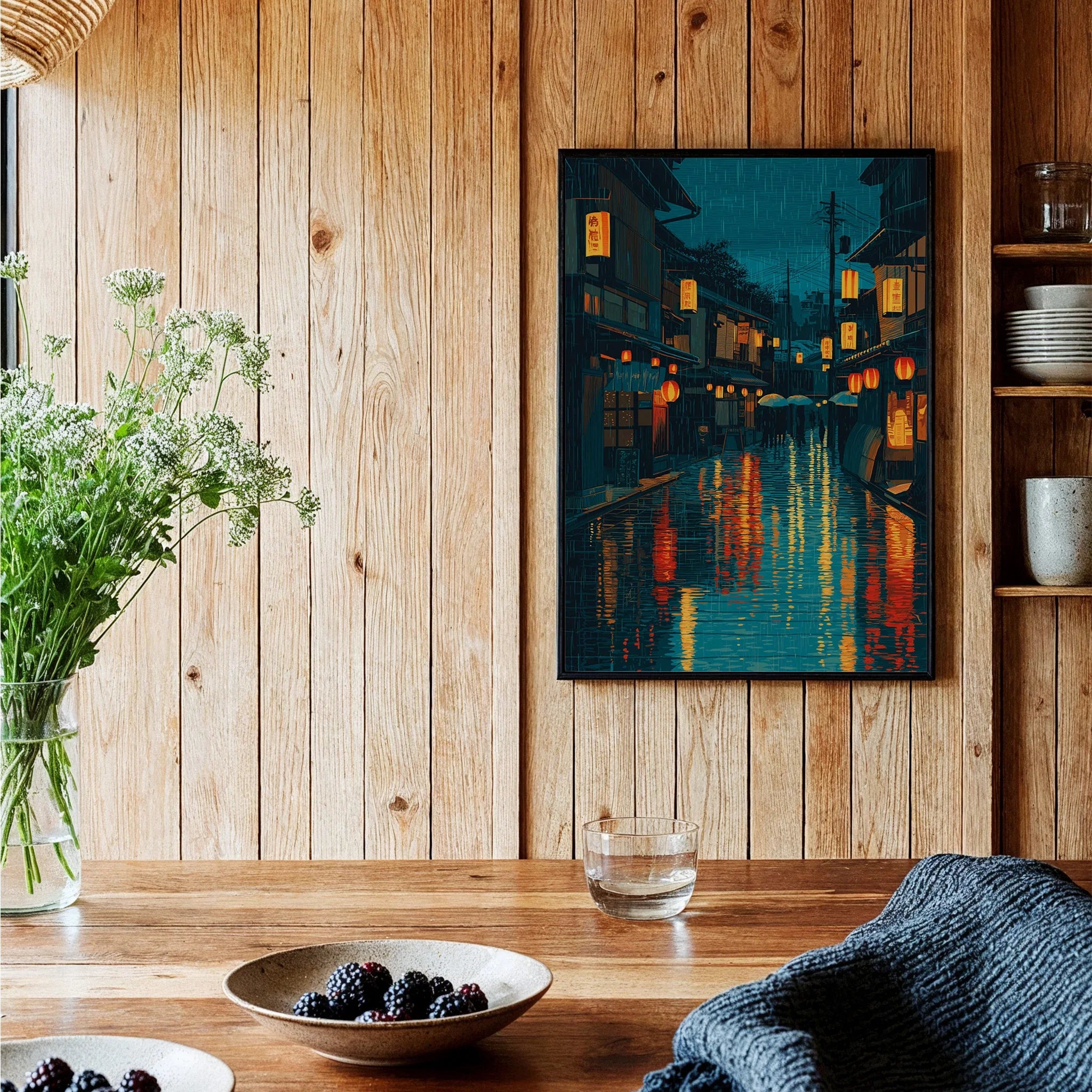 Framed Japanese street art print with lantern reflections, displayed in cozy kitchen decor
